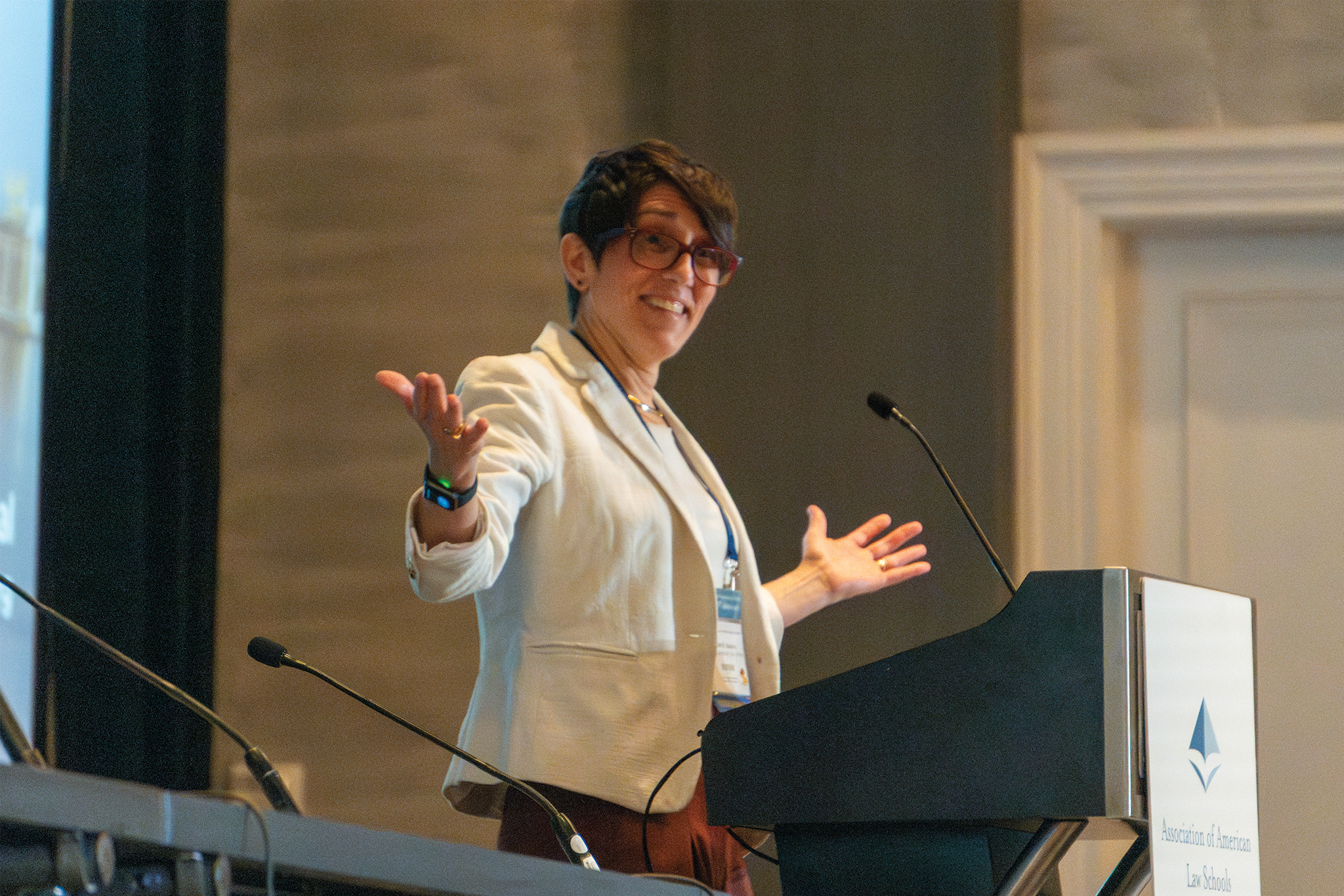 AALS Conference on Clinical Legal Education planning committee member Sarah Boonin (Suffolk Law) introduces the plenary session at this year's Clinical Conference.