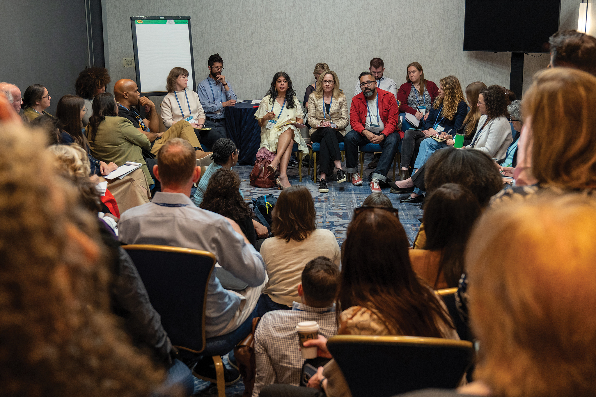 A small group discussion session at the 2025 AALS Conference on Clinical Legal Education.