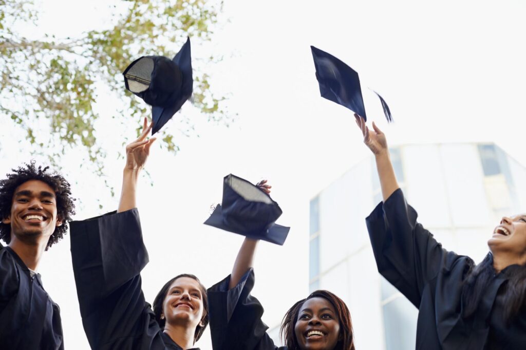 college students at graduation
