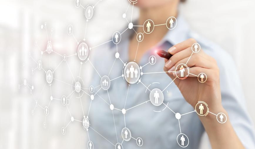 image of a woman connecting people using a virtual board
